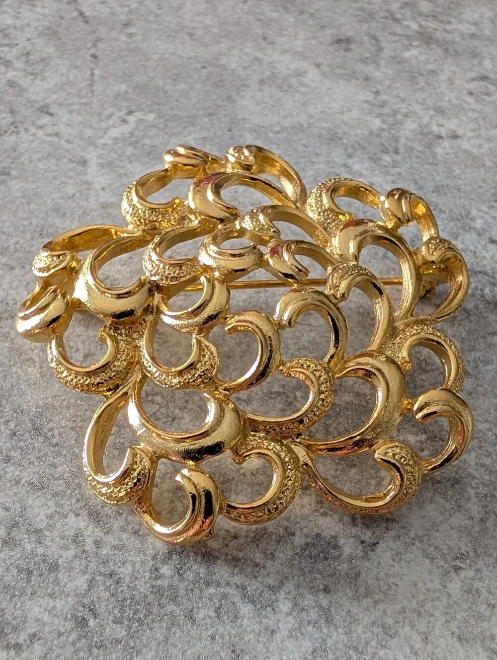Gold Tone Textured Floral Openwork Or Scroll Design Brooch